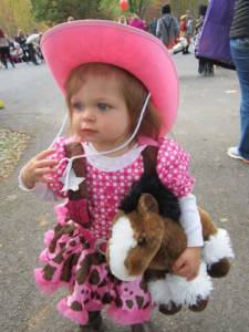 Little Girl in Pink Cowgirl Outfit